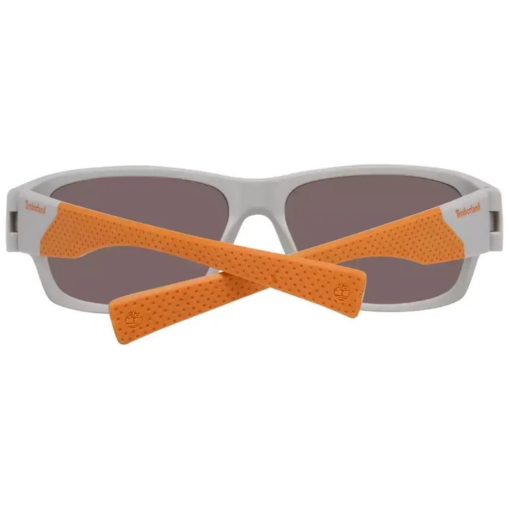 Timberland gray men's sport sunglasses with multicolor polarized lenses, orange temple accents, and 100% UVA & UVB protection.