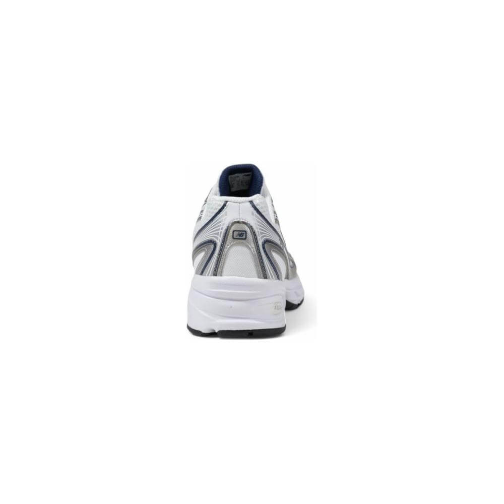 Back view of New Balance Blue Artificial Leather Sneaker with ergonomic design and cushioned sole for style and comfort.