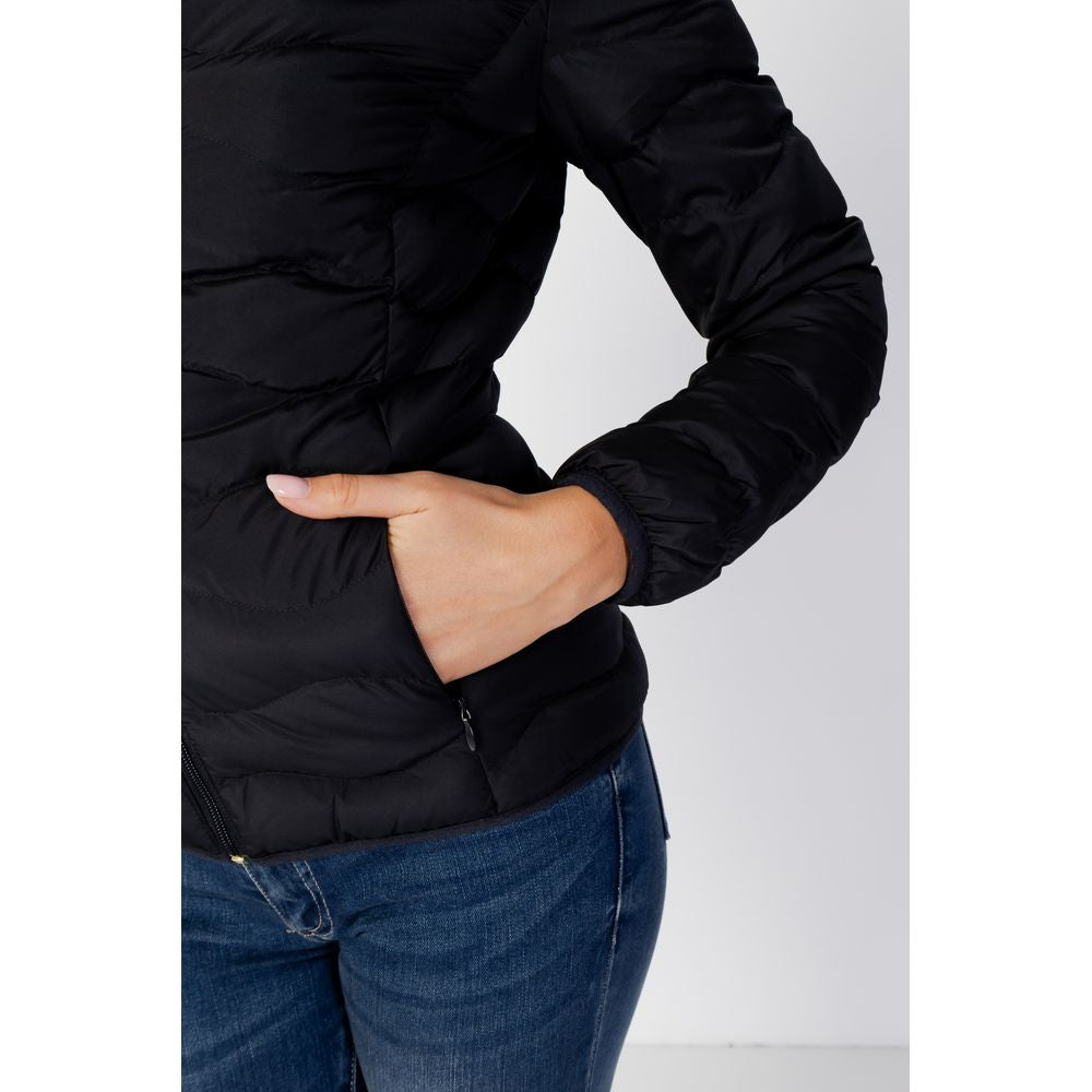 EA7 Emporio Armani women's black polyester jacket close-up, showcasing lightweight warmth and style for winter.