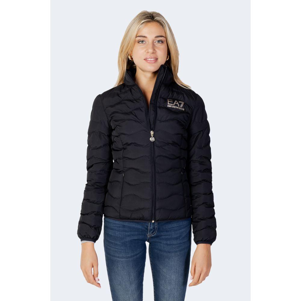 Woman wearing EA7 Emporio Armani black polyester jacket, perfect for winter with polyester padding for warmth and comfort.
